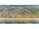 Aerial view of the coastline and surrounding neighborhood at 212 4Th Ave. N # 102, North Myrtle Beach, SC 29582