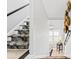 Staircase with leopard-print runner and modern lighting at 212 4Th Ave. N # 102, North Myrtle Beach, SC 29582