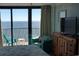 Bedroom with ocean view and balcony access at 2406 N Ocean Blvd. # Ph4-1704, Myrtle Beach, SC 29577