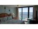 Main bedroom with ocean view and private balcony access at 2406 N Ocean Blvd. # Ph4-1704, Myrtle Beach, SC 29577