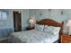 Bedroom with coastal decor and en-suite bathroom at 2406 N Ocean Blvd. # Ph4-1704, Myrtle Beach, SC 29577
