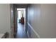 Light-filled hallway with wood-look floors leading to living area and ocean view at 2406 N Ocean Blvd. # Ph4-1704, Myrtle Beach, SC 29577