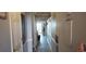 Hallway with doors and view into living area at 2406 N Ocean Blvd. # Ph4-1704, Myrtle Beach, SC 29577