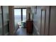 Hallway with ocean view from the end of the hall at 2406 N Ocean Blvd. # Ph4-1704, Myrtle Beach, SC 29577