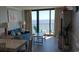 Living room boasts ocean views and a private balcony at 2406 N Ocean Blvd. # Ph4-1704, Myrtle Beach, SC 29577