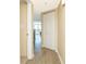 Hallway with tan walls and a door and closet for storage at 2504 N Ocean Blvd. # 832, Myrtle Beach, SC 29577