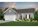 Gray house with white garage door and landscaping at 253 Hawks Run Dr., Calabash, NC 28467