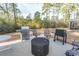 Relaxing backyard patio with grill, seating, and fire pit at 3040 Thoroughfare Dr., Conway, SC 29526