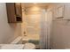 Bathroom with tub shower combination and built-in shelving at 3040 Thoroughfare Dr., Conway, SC 29526