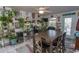 Bright sunroom dining area with many plants at 3040 Thoroughfare Dr., Conway, SC 29526