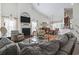 Spacious living room with hardwood floors, fireplace, and large windows at 3169 Shorecrest Bay Dr., Murrells Inlet, SC 29576