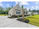 Beautiful home exterior with manicured landscaping, and a welcoming front porch at 3220 Highway 19, Conway, SC 29526