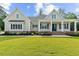 Charming single-Gathering home with a inviting front porch, manicured lawn and blue shutters at 3220 Highway 19, Conway, SC 29526