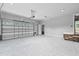 Spacious three car garage with sealed concrete floor and side access door to home interior at 3220 Highway 19, Conway, SC 29526