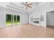 Bright living space with a modern fireplace and sliding glass doors to outdoor area at 3220 Highway 19, Conway, SC 29526