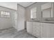 Bathroom with double vanity, light wood cabinets and walk-in shower at 3768 Green Sea Rd., Green Sea, SC 29545