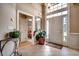 Bright and spacious entryway with tile flooring and large mirror at 4280 Doral Pl., Myrtle Beach, SC 29579