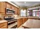 Kitchen with stainless steel appliances and an island at 4280 Doral Pl., Myrtle Beach, SC 29579