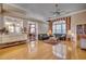 Spacious living room with hardwood floors, a large window, and comfortable seating at 4280 Doral Pl., Myrtle Beach, SC 29579