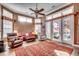 Spacious living room with hardwood floors, fireplace, and access to backyard at 4280 Doral Pl., Myrtle Beach, SC 29579