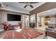 Bright living room featuring a large TV and hardwood floors at 4280 Doral Pl., Myrtle Beach, SC 29579