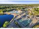 Aerial view of community amenities including pool and tennis courts at 4551 Weekly Dr, Myrtle Beach, SC 29579