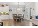 Bright dining area with a round table and four chairs, adjacent to kitchen at 4551 Weekly Dr, Myrtle Beach, SC 29579