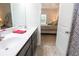 Bathroom with double vanity and view of bedroom at 456 Hayloft Circle, Conway, SC 29526