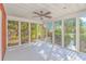 Spacious screened porch with whitewashed floors at 494 Saluda River Rd., Myrtle Beach, SC 29588