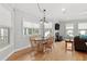 Bright dining area with hardwood floors and a table for six at 504 21St Ave. N, North Myrtle Beach, SC 29582