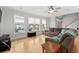 Comfortable living room with hardwood floors, modern fixtures, and plenty of seating for guests at 504 21St Ave. N, North Myrtle Beach, SC 29582