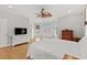 Comfortable main bedroom with hardwood floors, a ceiling fan, and private balcony access at 504 21St Ave. N, North Myrtle Beach, SC 29582