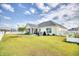 Large backyard with spacious lawn and privacy fence at 520 Hobie Cat Rd., Myrtle Beach, SC 29588
