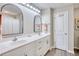 Bathroom with double vanity and arched mirrors at 520 Hobie Cat Rd., Myrtle Beach, SC 29588