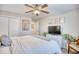 Comfortable bedroom with a queen bed, ceiling fan, and built-in closet at 520 Hobie Cat Rd., Myrtle Beach, SC 29588