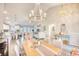 Spacious dining area with a farmhouse table, stylish chairs, and a bar cart at 520 Hobie Cat Rd., Myrtle Beach, SC 29588