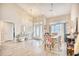 Elegant dining room with a wooden table, stylish chairs, and a bar cart at 520 Hobie Cat Rd., Myrtle Beach, SC 29588