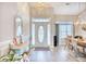 Open concept dining area featuring a light and airy feel, hardwood floors, and a charming chandelier at 520 Hobie Cat Rd., Myrtle Beach, SC 29588