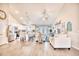 Open concept kitchen and living area with stainless steel appliances, granite countertops, and vaulted ceilings at 520 Hobie Cat Rd., Myrtle Beach, SC 29588