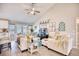 Spacious living room features vaulted ceilings, hardwood floors, and ample natural light at 520 Hobie Cat Rd., Myrtle Beach, SC 29588