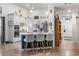 Open kitchen with a breakfast bar, white cabinets, and stainless steel appliances at 528 Fanciful Way, Myrtle Beach, SC 29588