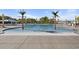 Community pool with a shallow end and palm trees at 528 Fanciful Way, Myrtle Beach, SC 29588