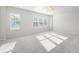 Bright bedroom with three windows and neutral carpeting at 5371 Knobcone Loop # B, Myrtle Beach, SC 29577