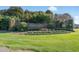 Pine Lakes community entrance with landscaped grounds and brick signage at 5371 Knobcone Loop # B, Myrtle Beach, SC 29577