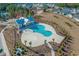 Community pool with surrounding landscaping at 5371 Knobcone Loop # B, Myrtle Beach, SC 29577