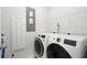 Laundry room with washer, dryer, and shelving at 5371 Knobcone Loop # B, Myrtle Beach, SC 29577