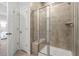 Large walk-in shower with glass enclosure and tiled walls at 5371 Knobcone Loop # B, Myrtle Beach, SC 29577