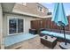 Outdoor patio with comfortable seating, wooden deck, and privacy fence at 5508 Porcher Dr. # 4, Myrtle Beach, SC 29577