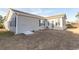 Spacious backyard with a view of the home's exterior at 567 Woodholme Dr., Conway, SC 29526