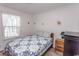 Cozy bedroom with a comfortable bed and window coverings at 567 Woodholme Dr., Conway, SC 29526